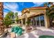 A luxurious backyard pool with ample lounge space and outdoor living, perfect for relaxation and entertaining at 7969 Bermuda Dunes Ave, Las Vegas, NV 89113