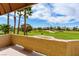 Relax on this balcony with a beautiful view of the lush, green golf course on a bright, sunny day at 7969 Bermuda Dunes Ave, Las Vegas, NV 89113