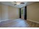 Cozy bedroom with wood floors, natural light, and neutral color palette at 7969 Bermuda Dunes Ave, Las Vegas, NV 89113
