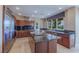 Chef's kitchen featuring stainless steel appliances, island, and granite countertops at 7969 Bermuda Dunes Ave, Las Vegas, NV 89113