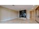 Bright living room with marble floors, fireplace, and built-in shelving at 7969 Bermuda Dunes Ave, Las Vegas, NV 89113