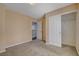 Bedroom featuring neutral walls and carpet, with closet and doorway access at 8039 Baldy Mountain Ave, Las Vegas, NV 89131