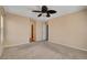 Spacious bedroom with carpet flooring and view into other rooms at 8039 Baldy Mountain Ave, Las Vegas, NV 89131