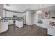 Bright kitchen features stainless steel appliances, white cabinetry, and an eat-in breakfast nook at 8039 Baldy Mountain Ave, Las Vegas, NV 89131