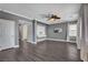 Open-concept living room with hardwood floors, recessed lighting, and stylish decor on the wall at 8039 Baldy Mountain Ave, Las Vegas, NV 89131