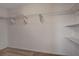 Spacious walk-in closet with shelving and hanging rods, offering ample storage space at 8039 Baldy Mountain Ave, Las Vegas, NV 89131