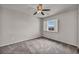 Bedroom boasts neutral walls, plush carpet, shutters, and ceiling fan at 8222 Sorrel St, Las Vegas, NV 89139