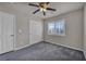 Bedroom featuring plush carpet, closet, and shuttered window at 8222 Sorrel St, Las Vegas, NV 89139