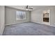 Spacious bedroom featuring plush carpet, neutral walls, and plantation shutters on the window at 8222 Sorrel St, Las Vegas, NV 89139