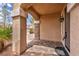 Inviting entrance with stone-accented columns and a custom brick paver walkway at 8222 Sorrel St, Las Vegas, NV 89139