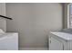 Laundry room featuring modern washer and dryer units and tiled floor at 8222 Sorrel St, Las Vegas, NV 89139