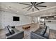 Open living space with hardwood floors, designer wallpaper, and an adjacent kitchen at 8222 Sorrel St, Las Vegas, NV 89139