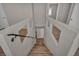 Interior staircase with wood-style treads offering a clear view to the lower level at 8222 Sorrel St, Las Vegas, NV 89139