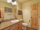 Neutral colored bathroom featuring a wood vanity with lots of storage space and wood floor at 855 E Ponderosa Rd, Mammoth Creek, UT 84735