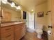 Bathroom with a glass enclosed shower, wood vanity and lots of storage space at 855 E Ponderosa Rd, Mammoth Creek, UT 84735