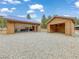 Two-car garages with open doors and ample parking space, perfect for car enthusiasts at 855 E Ponderosa Rd, Mammoth Creek, UT 84735