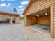 Inside one garage looking out to another, both log garages are concrete floored at 855 E Ponderosa Rd, Mammoth Creek, UT 84735