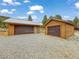 Exterior view of detached two-car garages, providing ample space for vehicles at 855 E Ponderosa Rd, Mammoth Creek, UT 84735