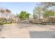 Outdoor basketball court with well-maintained concrete surface and chain-link fence in a community setting at 9100 Balcony Trellis Ave, Las Vegas, NV 89149
