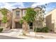 Charming two-story home with a well-maintained lawn and a private two car garage at 9100 Balcony Trellis Ave, Las Vegas, NV 89149