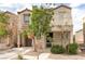 Charming two-story home with a well-maintained lawn and a private two car garage at 9100 Balcony Trellis Ave, Las Vegas, NV 89149