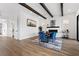 Bright dining room with modern decor, wooden beam ceiling and fireplace at 940 Viscanio Pl, Las Vegas, NV 89138