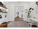 Bright home office space with built-in shelving and a view through the hallway at 940 Viscanio Pl, Las Vegas, NV 89138