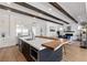 Bright kitchen boasts a spacious island with seating, modern appliances, and an open floor plan at 940 Viscanio Pl, Las Vegas, NV 89138