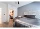 Comfortable bedroom featuring stylish bed and a walk-in closet with washer and dryer hookups at 9565 Camelback Creek Dr, Las Vegas, NV 89178