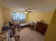 Bedroom with a ceiling fan, tile floor and lots of boxes at , Las Vegas, NV 89121