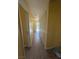 Hallway features tile flooring and multiple closets for storage at , Las Vegas, NV 89121
