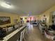 Open-concept living and dining area with tile floors, blending comfort and style at , Las Vegas, NV 89121