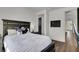 Inviting bedroom with a plush bed, dark wood accents, and cozy decor at , Las Vegas, NV 89135