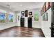 Bright bonus room with hardwood floors, lots of natural light, and built-in bookshelves at , Las Vegas, NV 89135