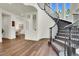 Bright foyer featuring a grand staircase and entry to the living and dining areas at , Las Vegas, NV 89135