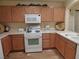 Functional kitchen with essential appliances and ample counter space at 10360 Lettuce Leaf St, Las Vegas, NV 89183