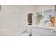 Clean bathroom with a shower-tub combination, white vanity, and modern fixtures at 11485 Vibrant Heights Dr # 32, Las Vegas, NV 89135