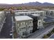 A modern apartment complex with contemporary architectural design and street access at 11485 Vibrant Heights Dr # 32, Las Vegas, NV 89135