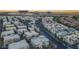 An aerial view of a townhome community with modern architecture, showcasing the neighborhood layout at 1157 Blossom Point St, Las Vegas, NV 89135