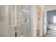 Modern bathroom featuring tiled shower with glass door at 1157 Blossom Point St, Las Vegas, NV 89135
