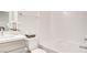 Bright bathroom featuring a bathtub, shower, and gray vanity at 1157 Blossom Point St, Las Vegas, NV 89135