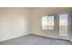 Bright bedroom with a window and a door to the outside at 1157 Blossom Point St, Las Vegas, NV 89135