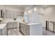 Modern kitchen with stainless steel appliances and a center island with pendant lighting at 1157 Blossom Point St, Las Vegas, NV 89135