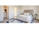Comfortable main bedroom with a large bed and stylish side tables at 1157 Blossom Point St, Las Vegas, NV 89135