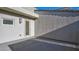 Private outdoor patio with smooth concrete flooring and neutral wall, perfect for relaxing at 1157 Blossom Point St, Las Vegas, NV 89135