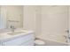 A stylish bathroom features modern fixtures and a bathtub with shower at 1163 Blossom Point St, Las Vegas, NV 89135