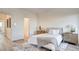 Well-lit bedroom features stylish decor, a comfortable bed, and elegant nightstands at 1164 Prospering Creek St, Las Vegas, NV 89135