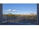 Enjoy the stunning city view from this private balcony with horizontal metal railings at 1187 Blossom Point St # 36, Las Vegas, NV 89135