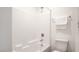 Bright bathroom featuring a tub and shower combination and a modern toilet at 1187 Blossom Point St # 36, Las Vegas, NV 89135