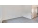 Neutral bedroom with plush carpeting and ample natural light from a large window at 1187 Blossom Point St # 36, Las Vegas, NV 89135